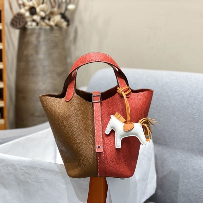H**mes shopping bags